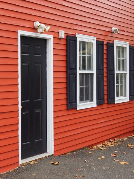 Red Vinyl Siding Installation in Lees Summit